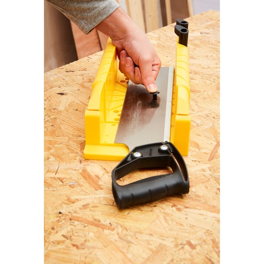 STANLEY 1-20-600 saw and mitre box set on workbench, close-up view.