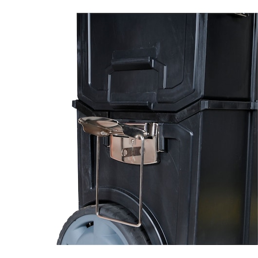 STANLEY 1-70-327 black plastic wheeled toolbox, close-up side view of metal latch and handle.