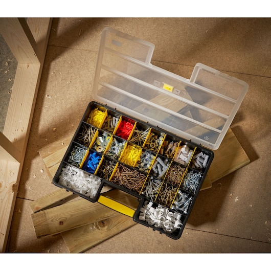 STANLEY 1-92-762 organizer box filled with assorted screws, nails, anchors, and washers, top view.