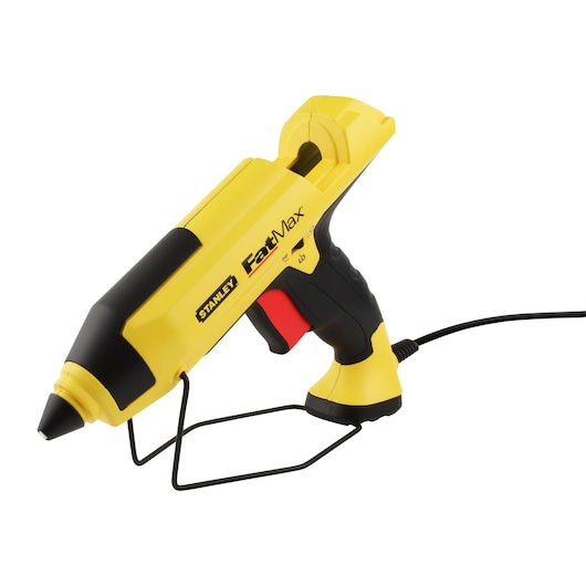 Stanley FatMax yellow glue gun with black and red accents and a metal stand, shown on a white background.
