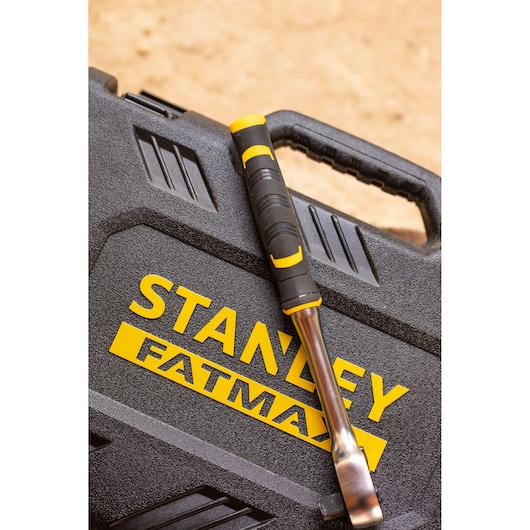 Photo of STANLEY FMMT82685-1 tool case with STANLEY FATMAX branding and a handled tool resting on top.