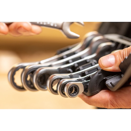 STANLEY FMMT82900-0 ratcheting wrenches in holder, close-up photo showing detail and hand grip.