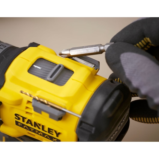 Photo of STANLEY SFMCD725B drill detail showing bit holder and drill bits, close-up angle.