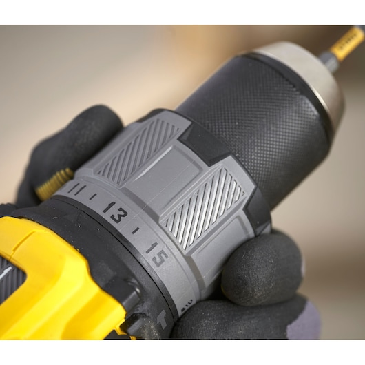 STANLEY SFMCD726B drill close-up, showing grey and yellow body and numbered torque settings.
