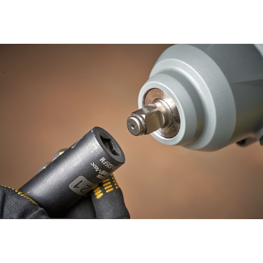 STANLEY SFMCF940M1 impact wrench front close-up with socket attachment held by gloved hand.