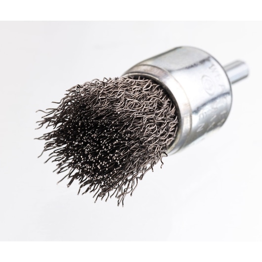Photo of STANLEY STA36025 wire cup brush with twisted steel bristles, side angle on white background, Photography category.
