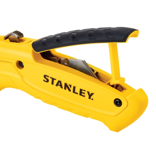 STANLEY STHT10430-0 yellow utility knife side view with black ergonomic handle, blade compartment visible.