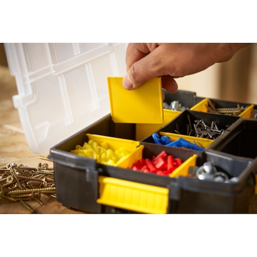 STANLEY STST1-70720 organizer box closeup with compartments for screws, bolts, and colored anchors.