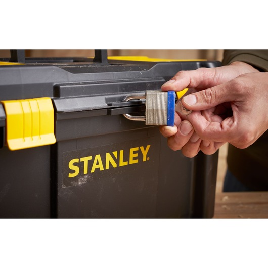 STANLEY STST1-75520 toolbox with padlock being locked, close-up photography of front latch.