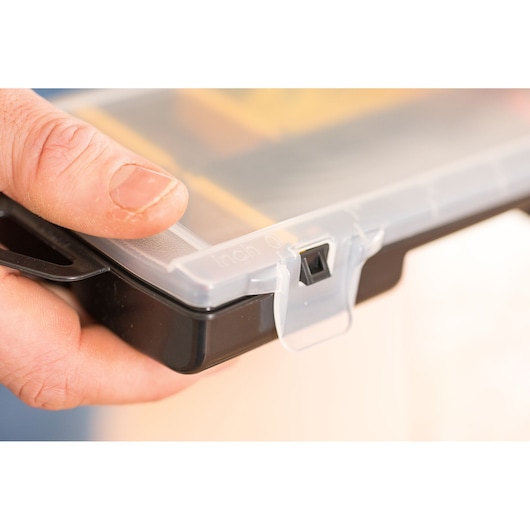STANLEY STST81679-1 photography of clear latch on black storage box held in hand